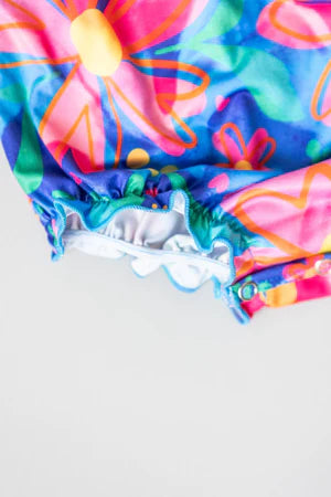 Springing Around Ruffle Cross Back Romper (6-12 Months)