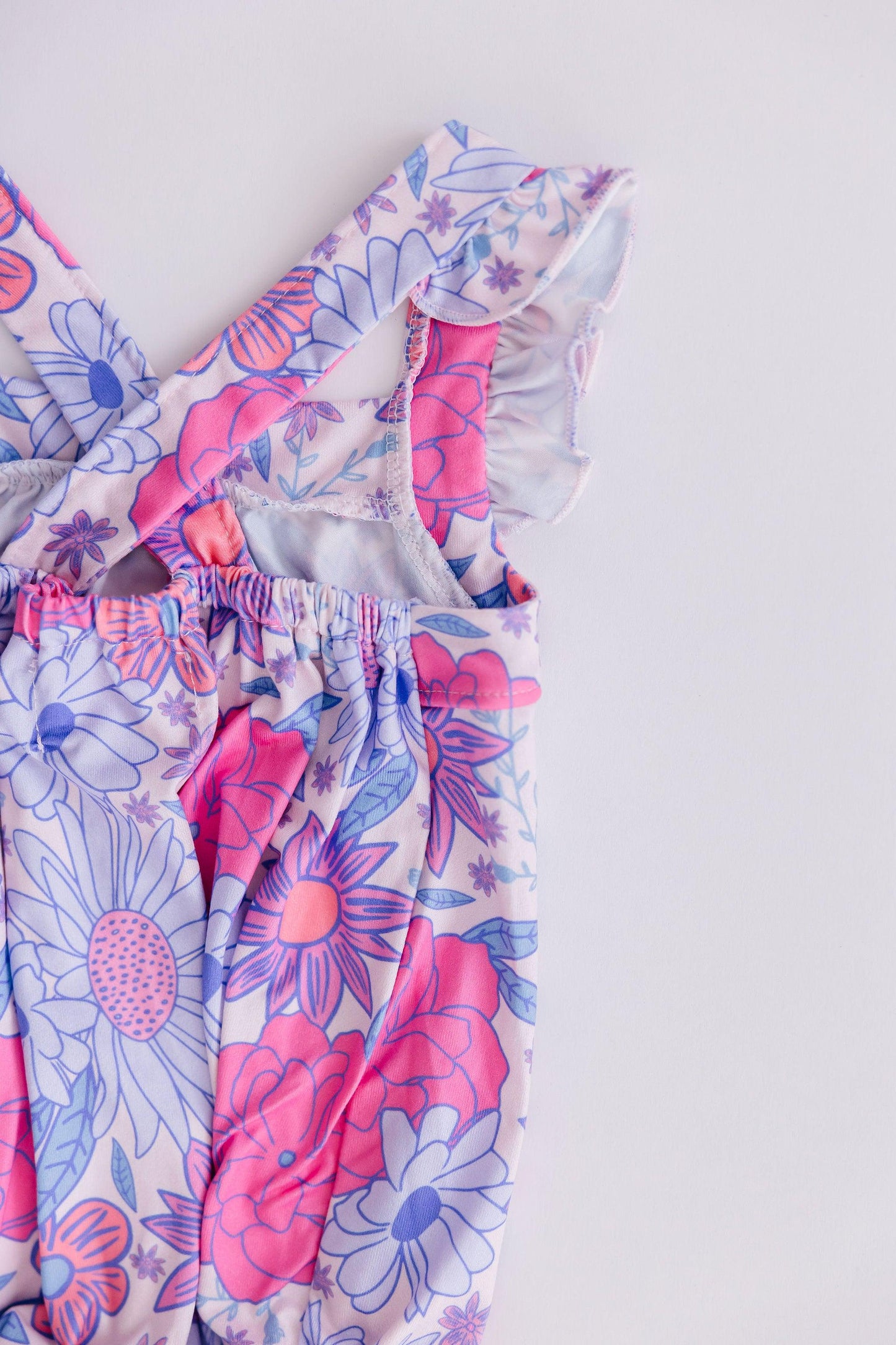 Sweet Springtime Ruffle Cross Back Romper (6-12 Months)